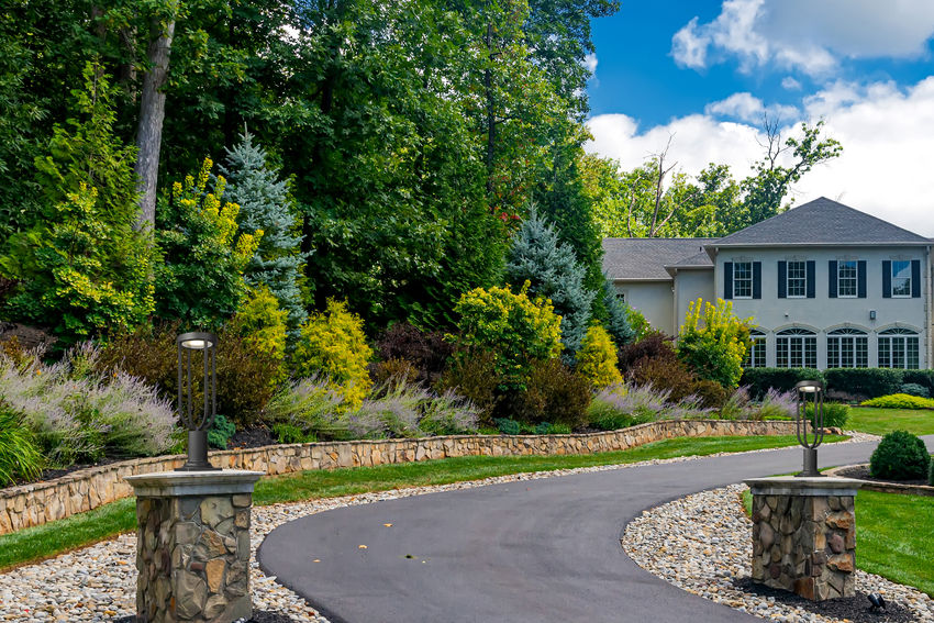 Z-Lite Leland Outdoor Post & Pier Mount Light installed on a home exterior