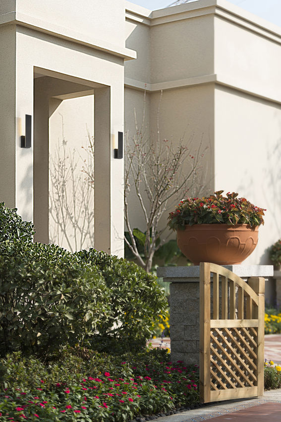 Z-Lite Stylet Outdoor Wall Light installed on a home exterior