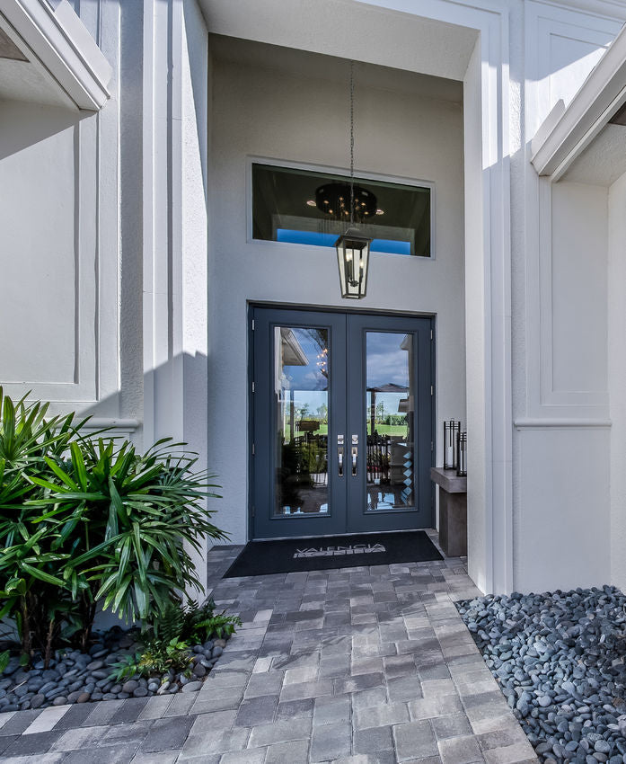 Z-Lite Gannon Outdoor Hanging Light installed on a home exterior