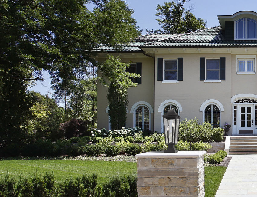 Z-Lite Gannon Outdoor Post & Pier Mount Light installed on a home exterior
