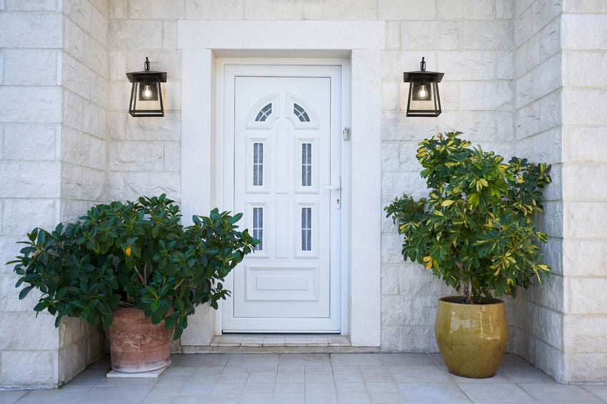 Z-Lite Rainer Outdoor Wall Light installed on a home exterior