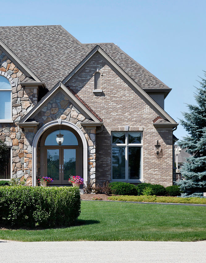 Z-Lite Davina Outdoor Hanging Light installed on a home exterior