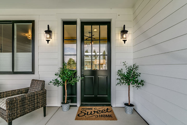 Z-Lite Davina Outdoor Wall Light installed on a home exterior