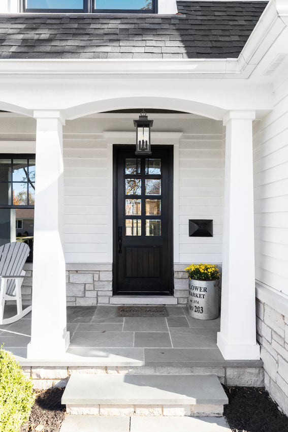 Z-Lite Tiberius Outdoor Hanging Light installed on a home exterior