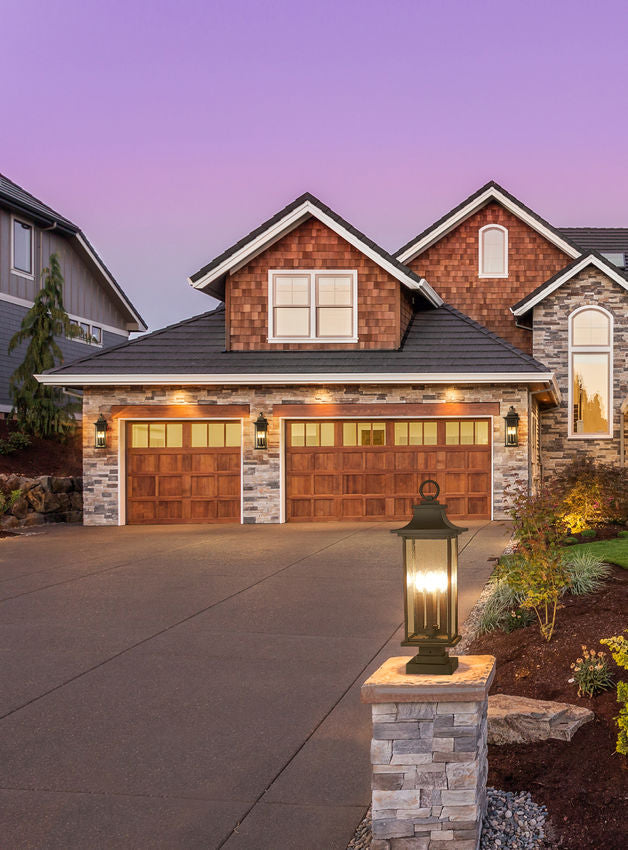 Z-Lite Tiberius Outdoor Post & Pier Mount Light installed on a home exterior
