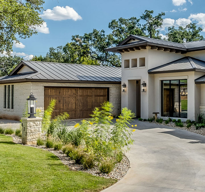 Z-Lite Tiberius Outdoor Post & Pier Mount Light installed on a home exterior