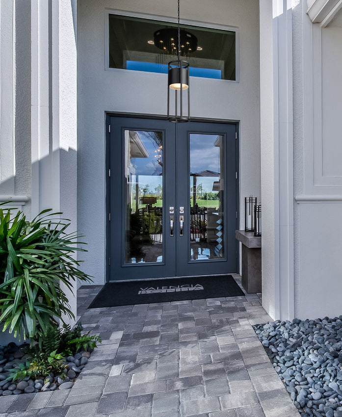 Z-Lite Luca Outdoor Hanging Light installed on a home exterior