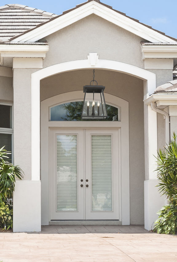 Z-Lite Broughton Outdoor Hanging Light installed on a home exterior