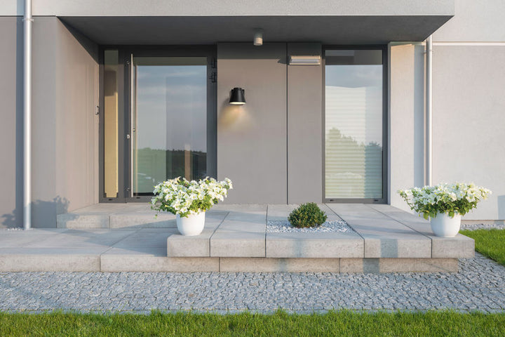 Z-Lite Asher Outdoor Wall Light installed on a home exterior