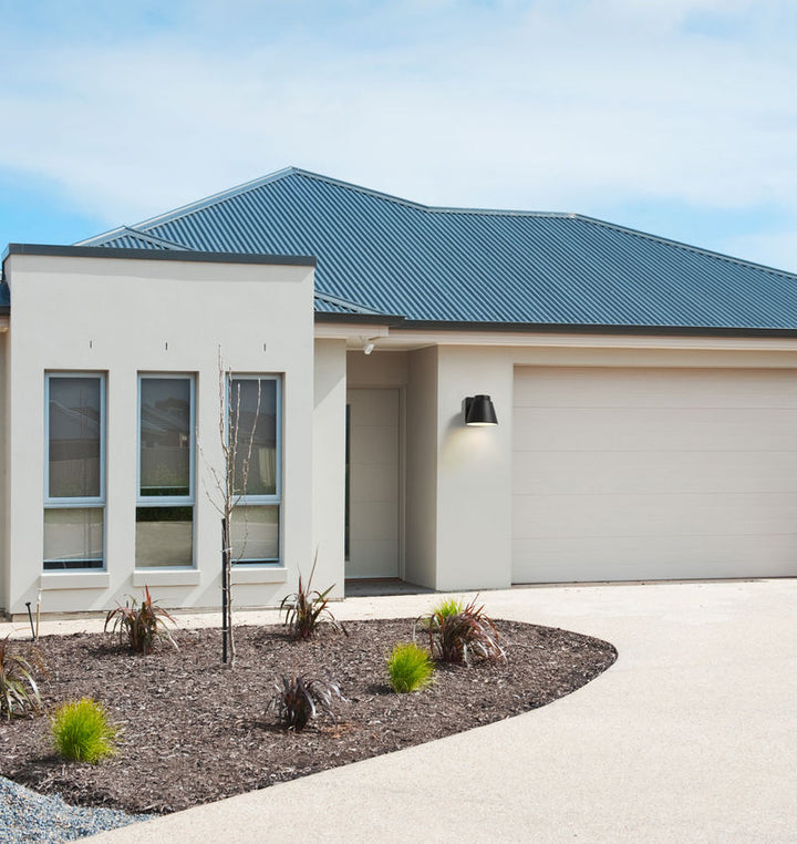 Z-Lite Asher Outdoor Wall Light installed on a home exterior