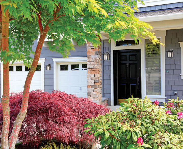 Z-Lite Aspen Outdoor Wall Light installed on a home exterior