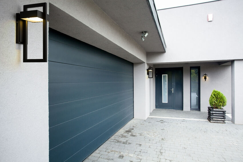 Z-Lite Luttrel Outdoor Wall Light installed on a home exterior
