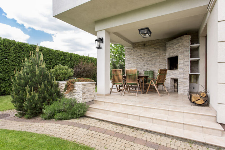 Z-Lite Beacon Outdoor Wall Light installed on a home exterior