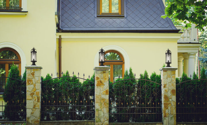 Z-Lite Roundhouse Outdoor Post & Pier Mount Light installed on a home exterior