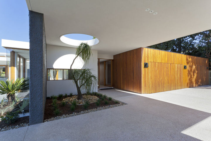 Z-Lite Obelisk Outdoor Wall Light installed on a home exterior