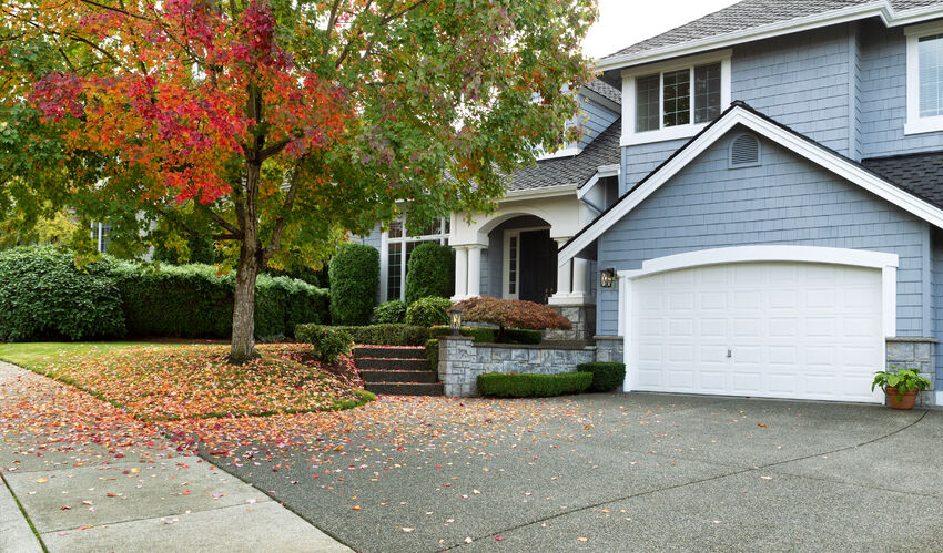 Z-Lite Brookside Outdoor Post & Pier Mount Light installed on a home exterior