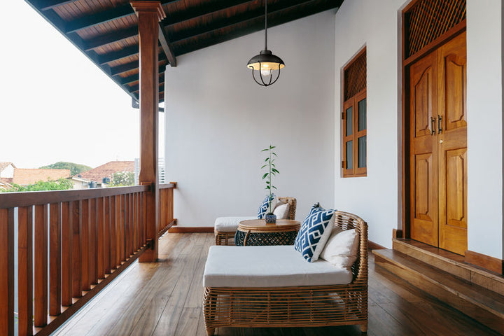 Z-Lite Ansel Outdoor Hanging Light installed on a home exterior