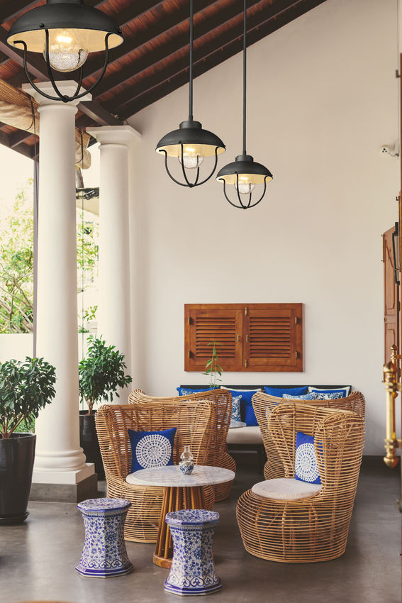 Z-Lite Ansel Outdoor Hanging Light installed on a home exterior