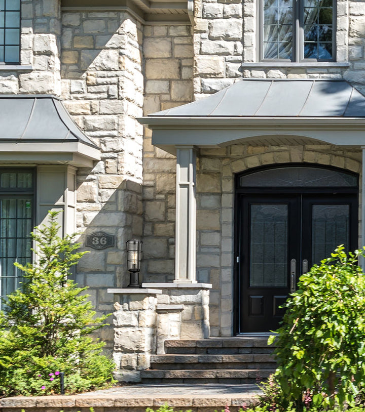 Z-Lite Helix Outdoor Post & Pier Mount Light installed on a home exterior