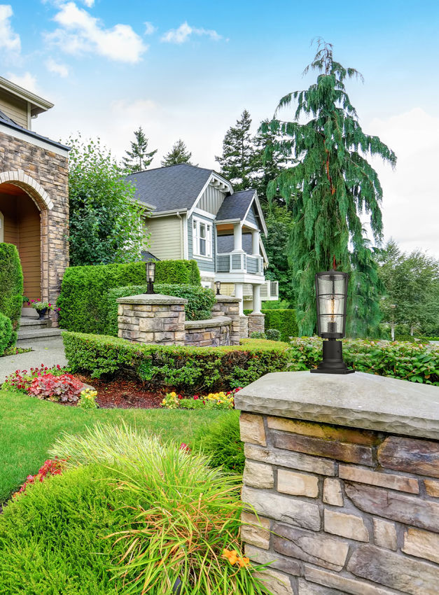 Z-Lite Helix Outdoor Post & Pier Mount Light installed on a home exterior