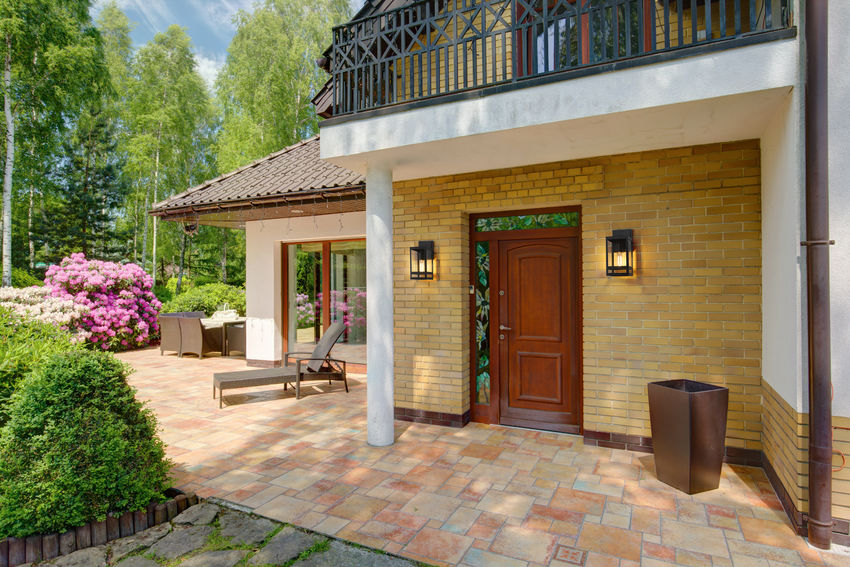 Z-Lite Nuri Outdoor Wall Light installed on a home exterior
