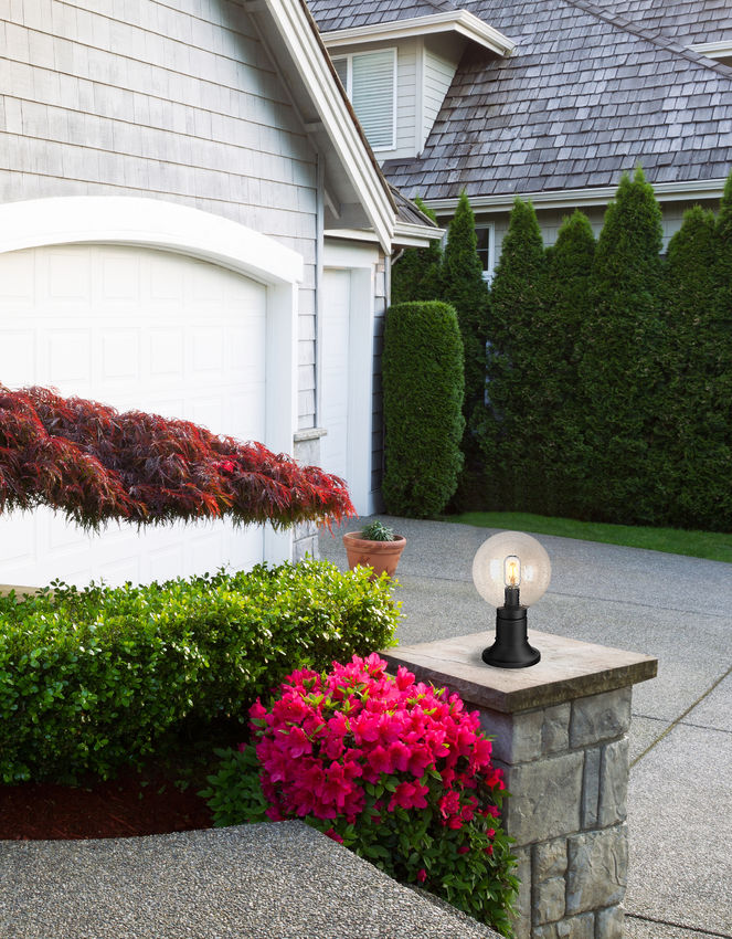 Z-Lite Laurent Outdoor Post & Pier Mount Light installed on a home exterior