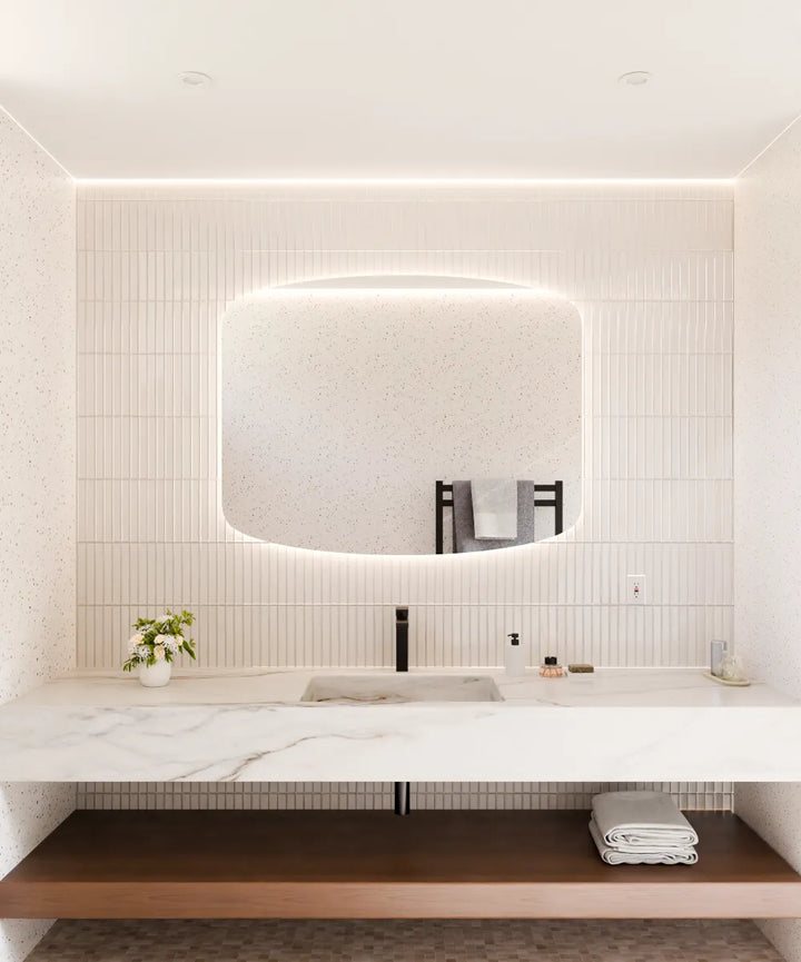 Electric Mirror Sentinel LED lighted mirror over vanity