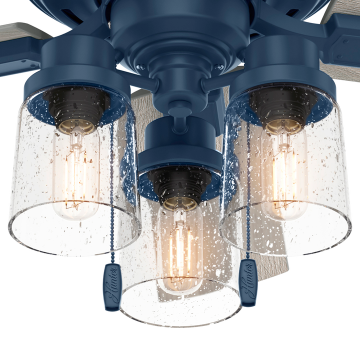 Hunter 44 inch Hartland Low Profile Ceiling Fan with LED Light Kit and Pull Chain Indoor Ceiling Fans Hunter Indigo Blue Light Gray Oak / Clear Seeded